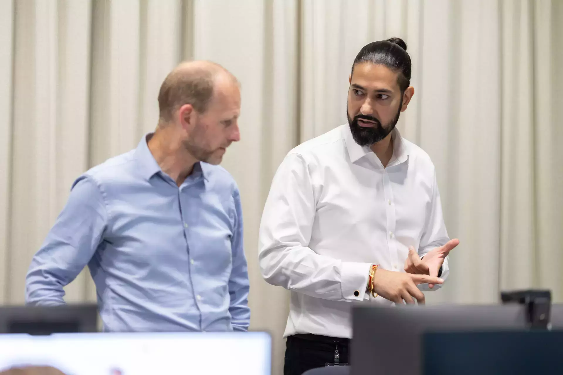 people_2_men_standing_talking