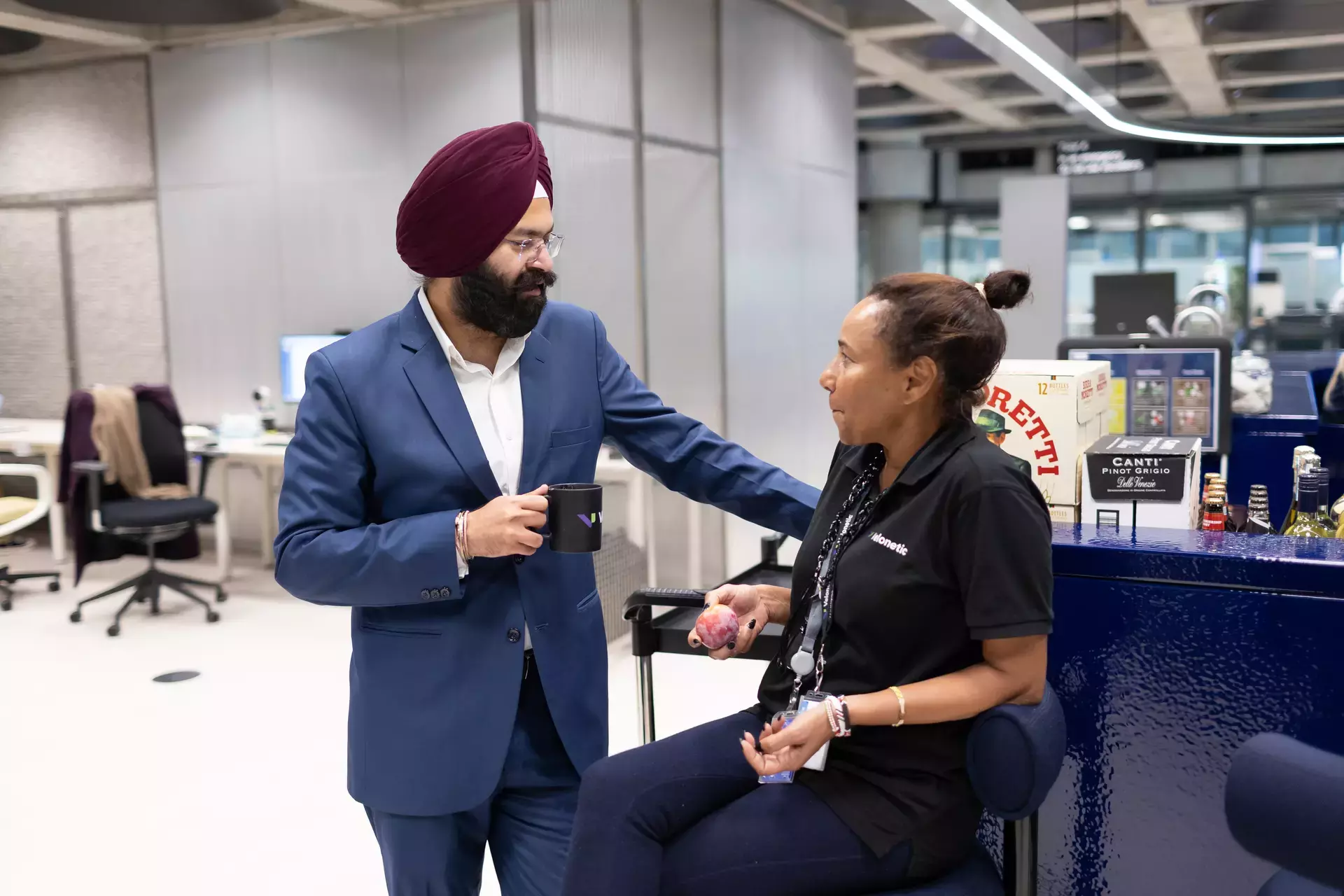 people_colleagues_talking_in_coffee_area