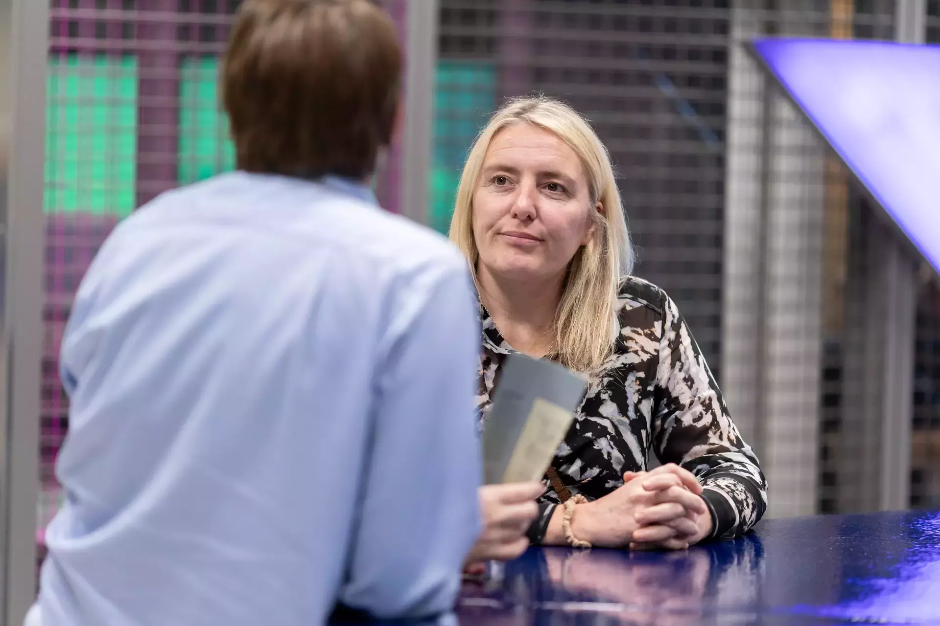 people_colleagues_talking_in_office_at_coffee_area