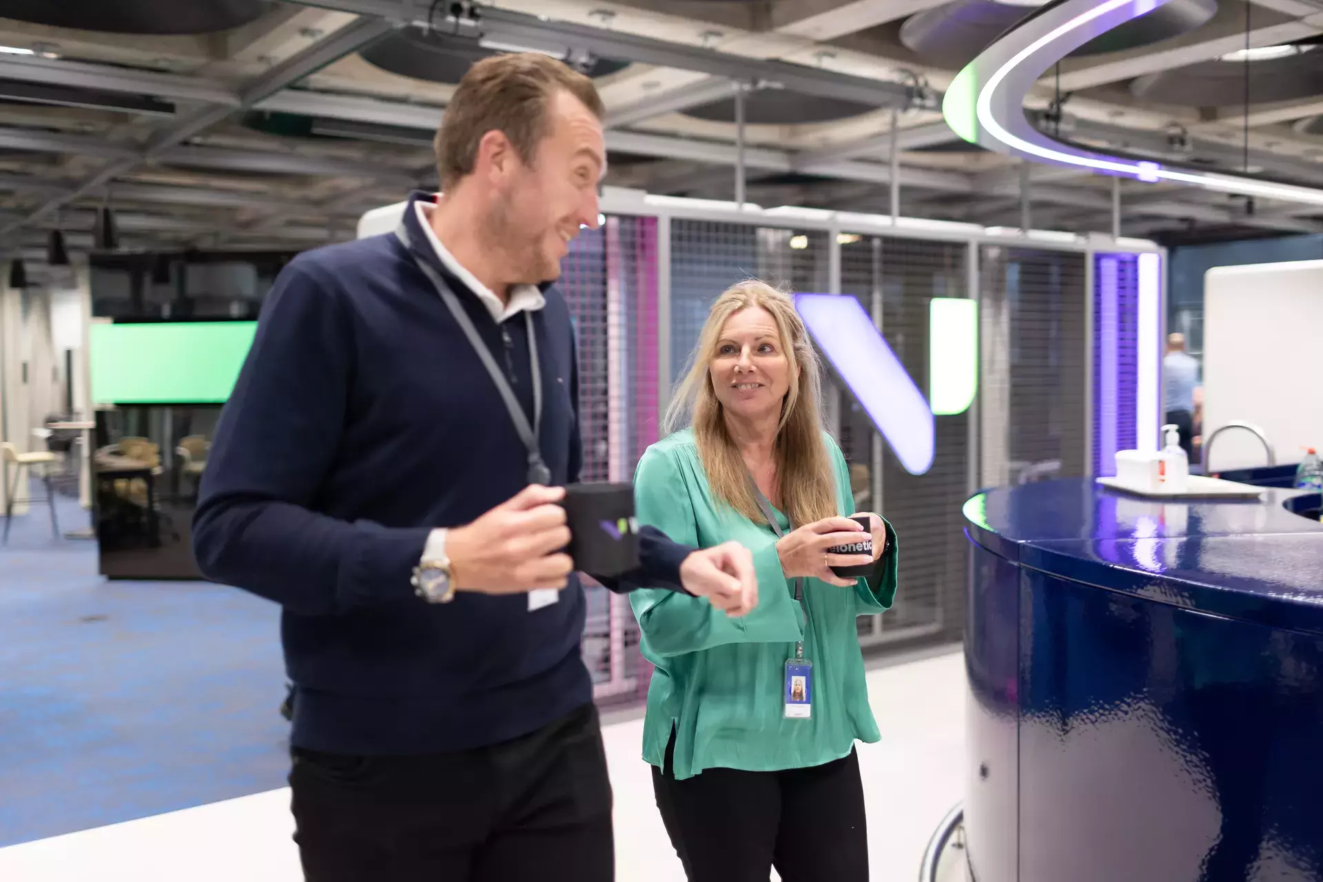 people_colleagues_walking_and_talking_in_office