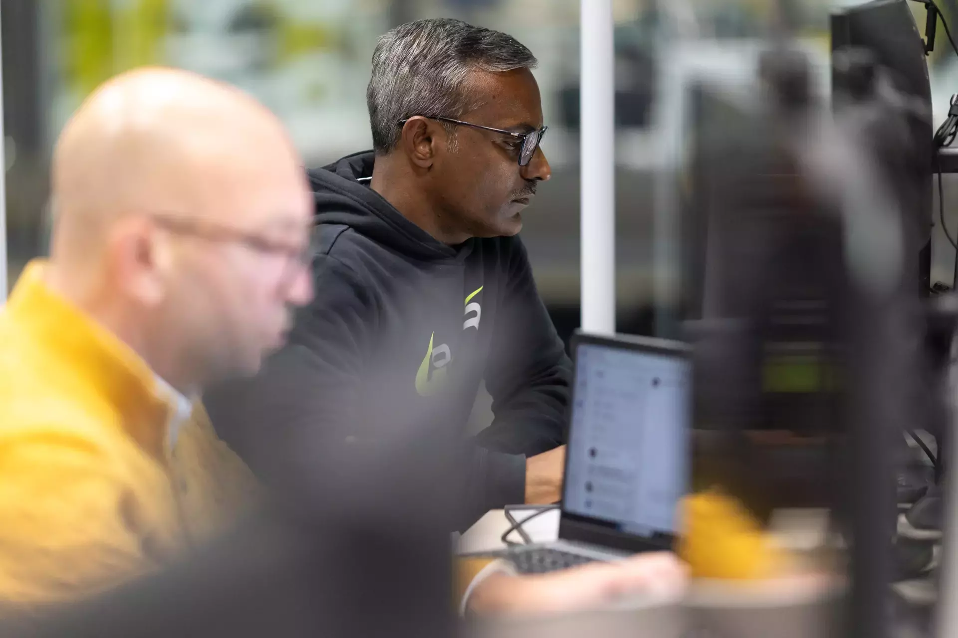 people_colleagues_working_at_computers_in_office