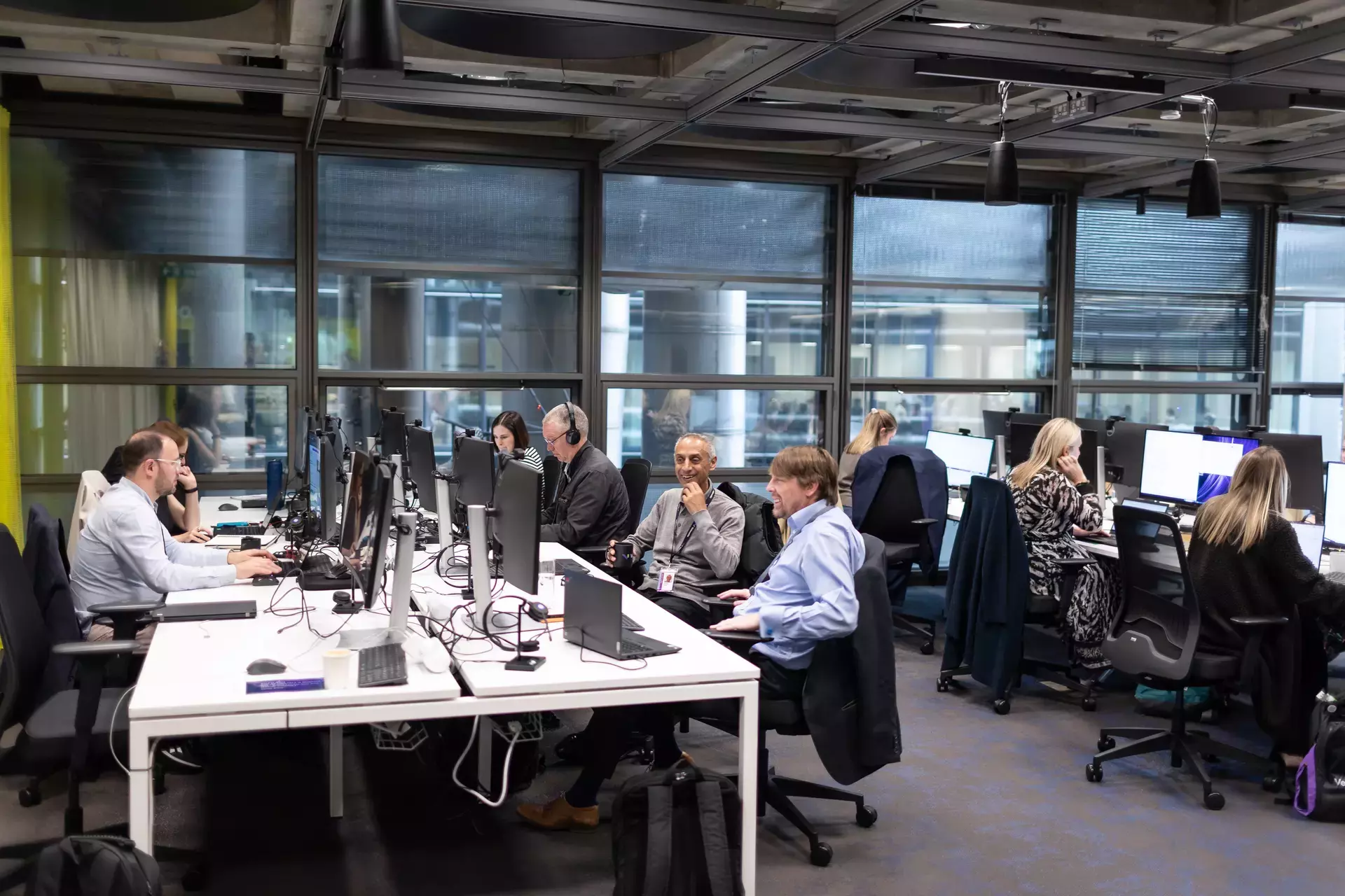 people_colleagues_working_on_laptops_in_office